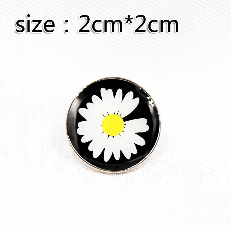 GD's same brooch