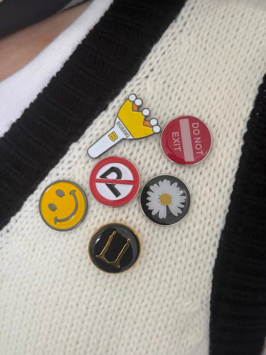 GD's same brooch
