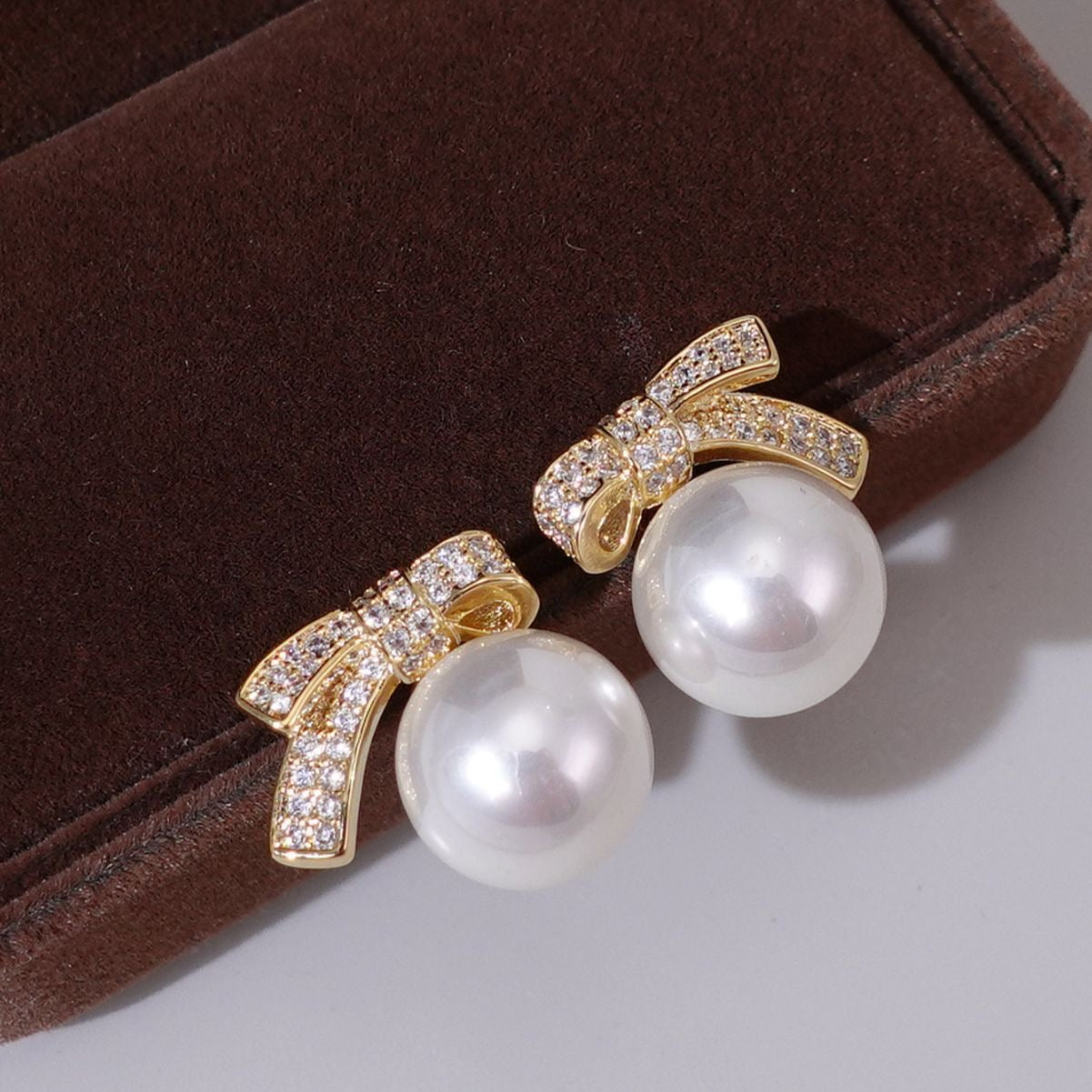 925 silver bow pearl earrings